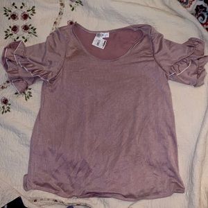 It’s a ruffle sleeve blouse